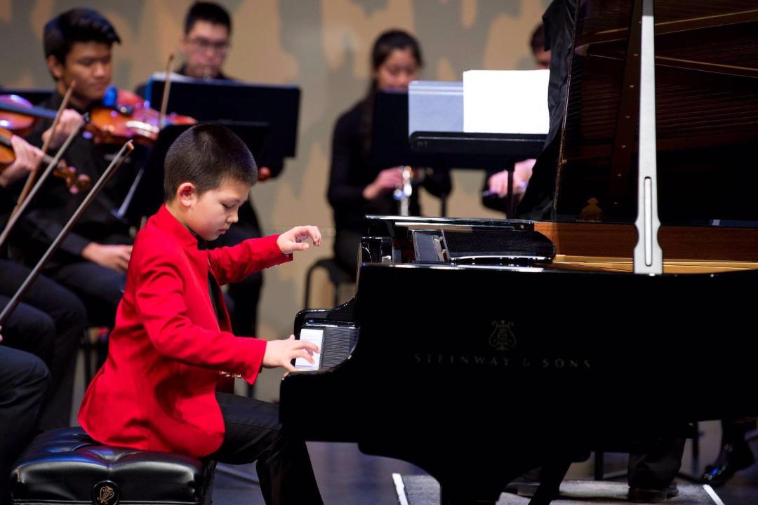 Ryan Huang | Ryan’s joy has always been to perform on stage. International, local, small, massive, rain or sunshine - Ryan has always stepped up to the plate and enthralled audiences with his impeccable talent. | Photo Courtesy of Annie Huang